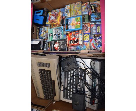 A vintage Commodore 64 computer together with a quantity of games and similar to include Ghostbusters and The Double etc and 
