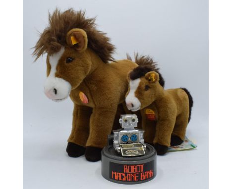 A pair of Steiff horses to include Rico and Corso together with a Hong Kong Robot Machine Bank (3).  