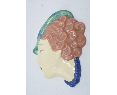 1930s Art Deco wall plaque in the form of a ladies' head, stamped 'Czechoslovakia' to rear, 19cm tall.  In good condition wit