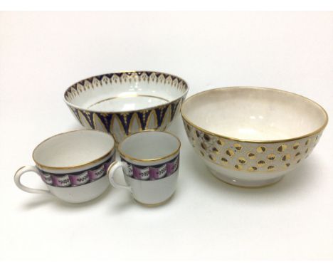 comprising five circular bowls and six cups, predominantly New Hall, decorated with floral and leaf designs, including patter