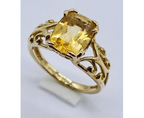 A citrine ring set in 9ct gold