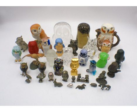 A collection of owl figures, along with a few other animals, some metal, glass and ceramic, including Franklin Mint, Beswick 