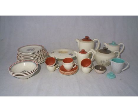 A part Poole Pottery tea/coffee set, along with a Grindley "Fantasia" Part dinner set.