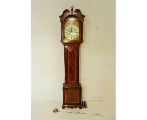 A Georgian inlaid mahogany eight day longcase clock with fusee movement. Silvered dial engraved with foliate decoration and o