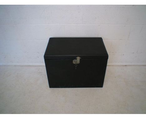 A vintage painted wooden car trunk.