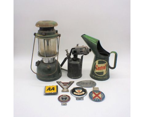 A quantity of vintage car badges, including some of local interest, along with a Castrol oil jug, Burmos blow torch and a Bia