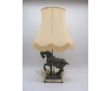 A table lamp in the form of a horse, on a marble plinth, with shade.