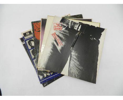 A small quantity of 12" vinyl records, including The Rolling Stones - 'Sticky Fingers', 'Beggars Banquet', 'The Rolling Stone