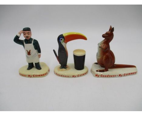 A collection three vintage Carlton Ware ceramic Guinness figures including a kangaroo, toucan with pint of Guinness and zoo k