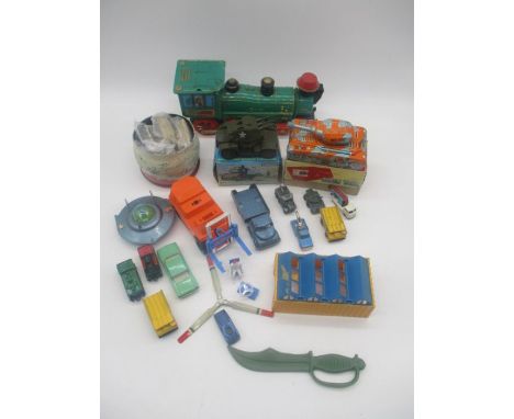 A collection of vintage toys including a tin plate train, small collection of various loose die-cast vehicles, boxed Clockwor