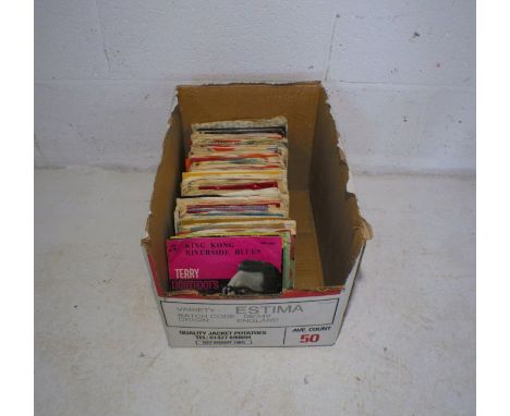 A quantity of 7" vinyl records, including Buddy Holly, Everly Brothers, Bobby Vee, Boney M, Hot Chocolate etc.