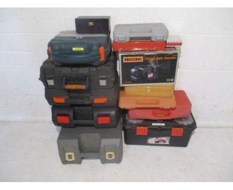 A selection of tools including a Challenge belt sander, Grinder accessories, a Power Devil angle grinder, a Workx orbital san