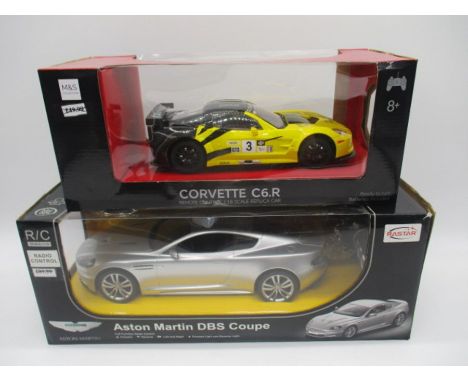 A boxed Rastar Aston Martin DBS Coupe radio controlled car (1:14 scale, along with a boxed M&amp;S Collection Crovette C6.R r