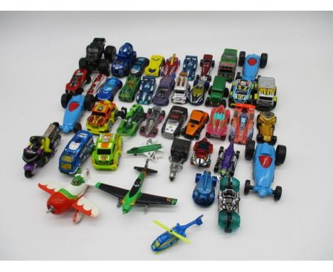 A collection of die-cast vehicles including Hot Wheels, Real Toy, HTI Toys etc 