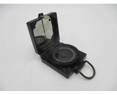 A military magnetic marching compass with board arrow mark - numbered B22421