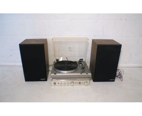 A vintage Hitachi Turntable Model HT-324, along with a Hitachi Stereo Receiver Model SR-2010L and a pair of Hitachi SS-8470G 