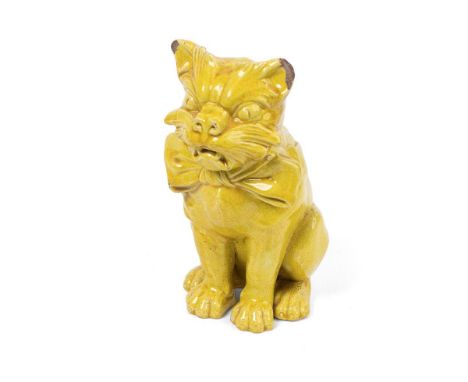 Wardle &amp; Co Grotesque Pottery Cat, in a seated stance wearing a bow tie, yellow glaze, impressed marks "Wardle England" a