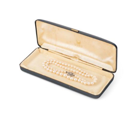 A single row graduated cultured pearl necklace with 9ct white gold clasp, set rose-cut diamond, 54cm long end to end, cased.