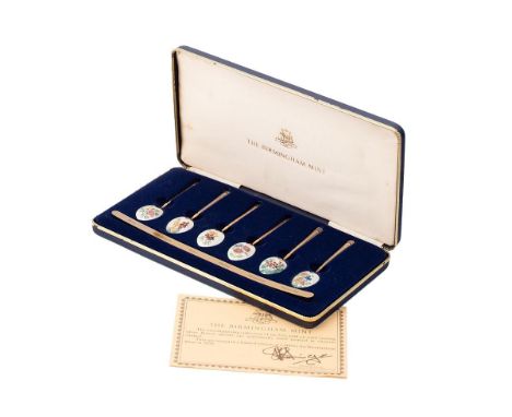 A cased set of six Elizabeth II Birmingham Mint silver gilt and enamel collector's spoons, bowl backs painted with a differen
