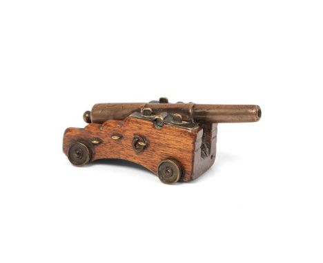 c19th bronze miniature live firing obsolete calibre cannon with wooden carriage c1890 the item is in very good condition with