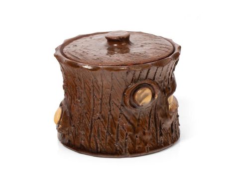 An early 20th Welsh Folk Art Buckley slipware lidded tobacco jar inscribed 'Have a Pipe', displays well with odd chips notice