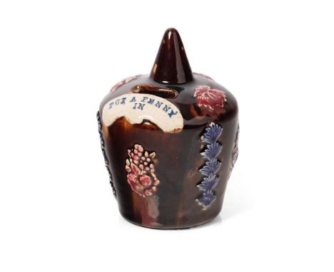 A c19th Measham bargeware money box of baluster form with conical finial inscribed 'put a penny in' c1880 excellent undamaged
