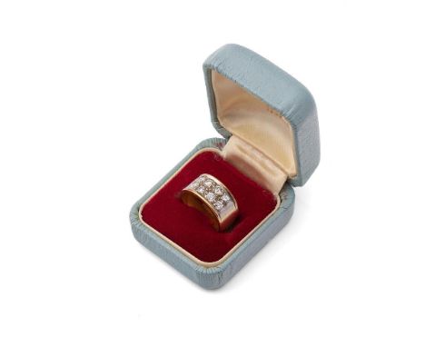 An 18ct gold and diamond set eight stone ring, of brutalist design, circa 1975,  each diamond of just over 0.1ct, total diamo