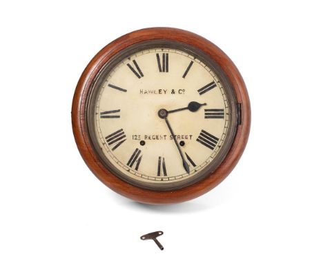 An oak cased wall clock / school clock. Brass bezel with white dial and Roman numerals, HAWLEY &amp; Co. 123 REGENT STREET, p