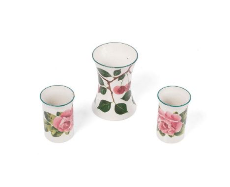 Wemyss: a pair of Cabbage Rose small vases / beakers, 8.5cm tall and a Cherries vase, 11.5cm tall (3).  One cabbage vase is I