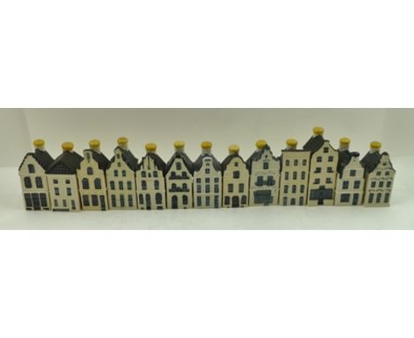 A COLLECTION OF THIRTEEN VARIOUS CERAMIC MODELS OF DELFT HOUSES, made by KLM to contain Bols alcoholic drink, tallest 11.5cm 