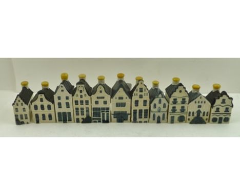 A COLLECTION OF ELEVEN VARIOUS CERAMIC MODELS OF DELFT HOUSES, made by KLM to contain Bols alcoholic drink, tallest 10.5cm hi
