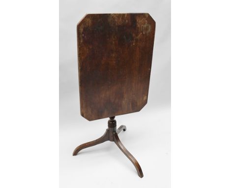 A 19TH CENTURY MAHOGANY WINE TABLE, having canted top, on ring turned stem with three arched tripod supports, 60cm x 42cm 