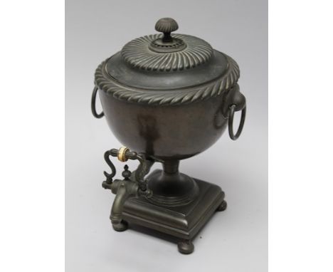 A 19TH CENTURY COPPER SAMOVAR, with cover and ring handles, and tap, on a square base, contains the metal warming block, 32cm