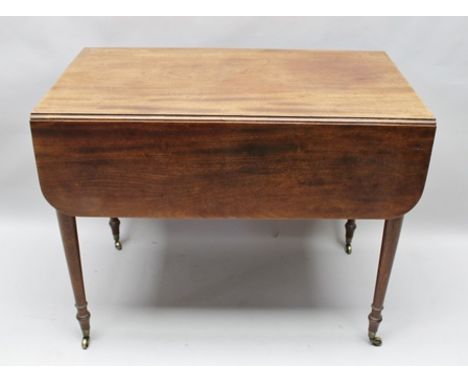 A 19TH CENTURY MAHOGANY PEMBROKE TABLE, with real and faux frieze end drawers, brass ring handles, on turned supports with ca