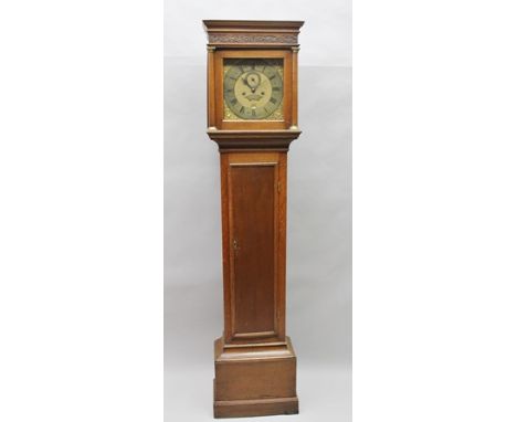 CHRIS GODDARD, LONDON AN OAK LONGCASE CLOCK, the flat top hood with blind carved frieze, brass mounted columns flank the squa