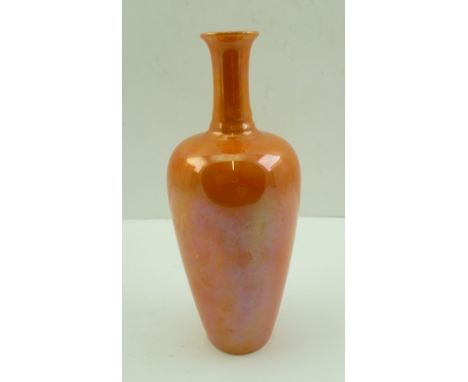 A ROYAL DOULTON ORANGE LUSTRE GLAZED CERAMIC VASE of narrow neck baluster form, printed factory mark to base, 20cm high 