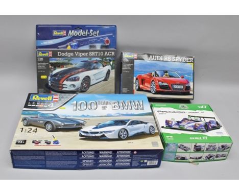 THREE REVELL MODEL KITS 1:24 AND 1:25 SCALE including Dodge Viper SRT10ACR, Audio R8 Spider and 100 years of BMW new car kit,