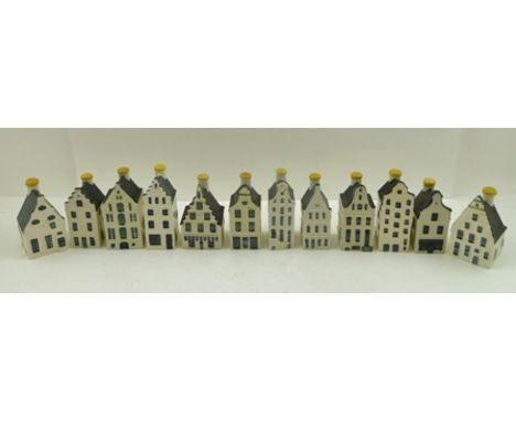 A COLLECTION OF TWELVE VARIOUS CERAMIC MODELS OF DELFT HOUSES, made by KLM to contain Bols alcoholic drink, tallest 11cm high