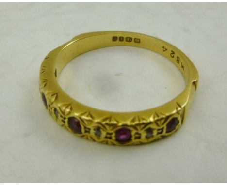 AN 18CT GOLD LADY'S RUBY AND DIAMOND SET RING, size M, weight 3.7g. 