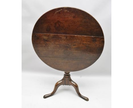 A GEORGE III OAK TRIPOD WINE TABLE, having circular top, 74cm diameter, turned barrel stem and arched triform supports