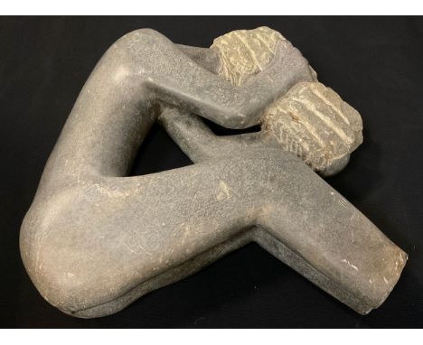 Tribal Art - a carved hardstone figure of a weeping woman, polished and textured finish, indistinctly signed, 50cm high 