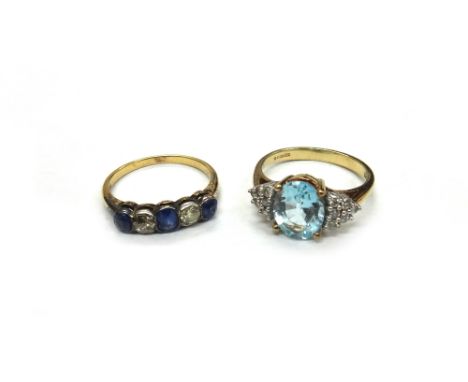 An early 20th century sapphire and diamond five stone ring, with three cushion shaped pale blue sapphires spaced by an old cu
