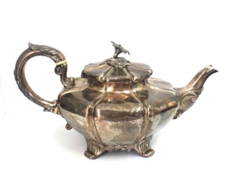 A William IV silver melon pattern teapot, John Tapley, London 1836, the hinged cover with a cast flowerhead and leaf finial, 