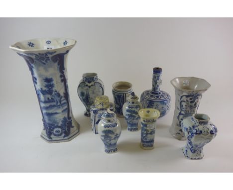 A collection of nine Dutch Delft blue and white vases, 19th and 20th century, of varying shapes and sizes and a similar tea c