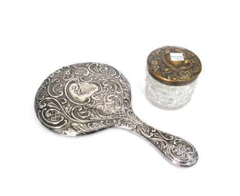 An Edwardian silver mounted hand mirror, Chester 1908, heavily foliate embossed, and a large quantity of electroplate to incl