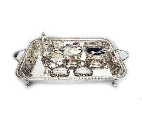 An electroplate rectangular two handled dish, 35cm across, a 'Georgian' style cruet set, shaped oval tray, tea service, cased