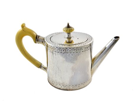 A George III silver drum shape teapot, John Parker & Edward Wakelin, London 1775, with engraved upper and lower friezes, ivor