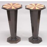 A PAIR OF TWO TONE OCTAGONAL DECO STYLE TABLES. 2ft 7ins high, 1ft 4ins diameter.