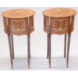 A PAIR OF OVAL INLAID BEDSIDE TABLES with three drawers on curving legs. 2ft 4ins high, 1ft 4ins