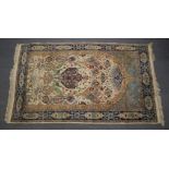 A GOOD PERSIAN BORDER CARPET with floral decoration. 219cm x 138cm.